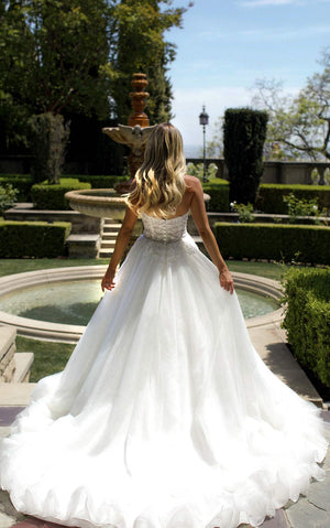 princess-inspired ballgown wedding dress. A romantic sweetheart neckline